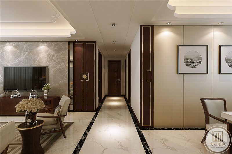 从走廊处能够看到客餐厅的一隅，走廊时简约的米色大理石板