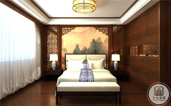 卧室是中式的镂刻纹样床头背景是宋朝文人山水画